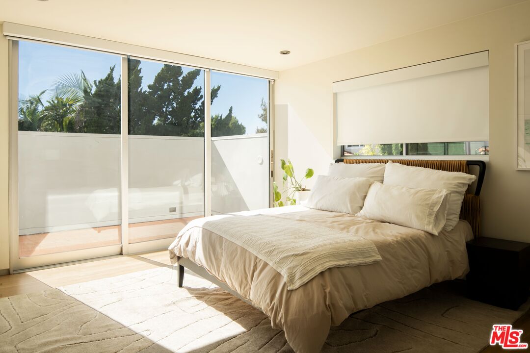 2008 Hercules Drive Los Angeles, CA 90046 - Photo 26 of 36 a bedroom with a bed and a large window