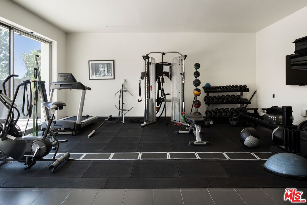 2008 Hercules Drive Los Angeles, CA 90046 - Photo 28 of 36 a room with gym equipment and view of living room