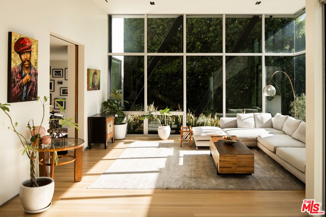 2008 Hercules Drive Los Angeles, CA 90046 - Photo 7 of 36 a living room with furniture and a potted plant