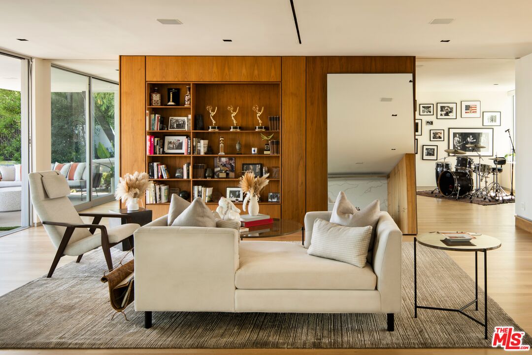 2008 Hercules Drive Los Angeles, CA 90046 - Photo 9 of 36 a living room with furniture and a floor to ceiling window