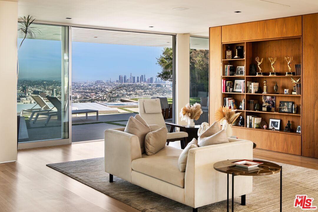 2008 Hercules Drive Los Angeles, CA 90046 - Photo 10 of 36 a living room with furniture and a floor to ceiling window