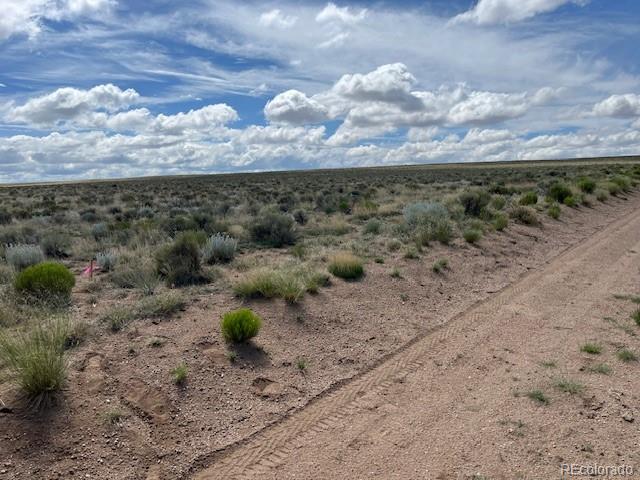 Lot 7 Jack Road Sanford, CO 81151 - Photo 9 of 11 a view of a road with wooden fence