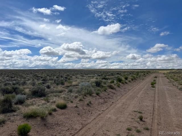 Lot 7 Jack Road Sanford, CO 81151 - Photo 10 of 11 a view of a dry yard with wooden fence