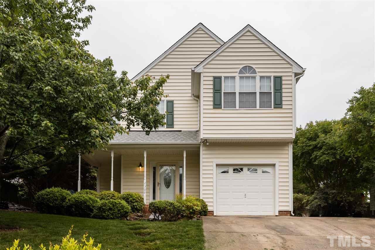 2305 Dahlgreen Road Raleigh, NC 27615 - Photo 1 of 19 a view of a house with a yard and plants