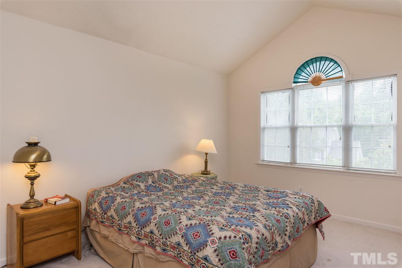 2305 Dahlgreen Road Raleigh, NC 27615 - Photo 12 of 19 a bedroom with a bed and a window