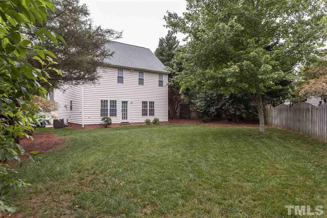 2305 Dahlgreen Road Raleigh, NC 27615 - Photo 19 of 19 a view of a house with backyard and garden