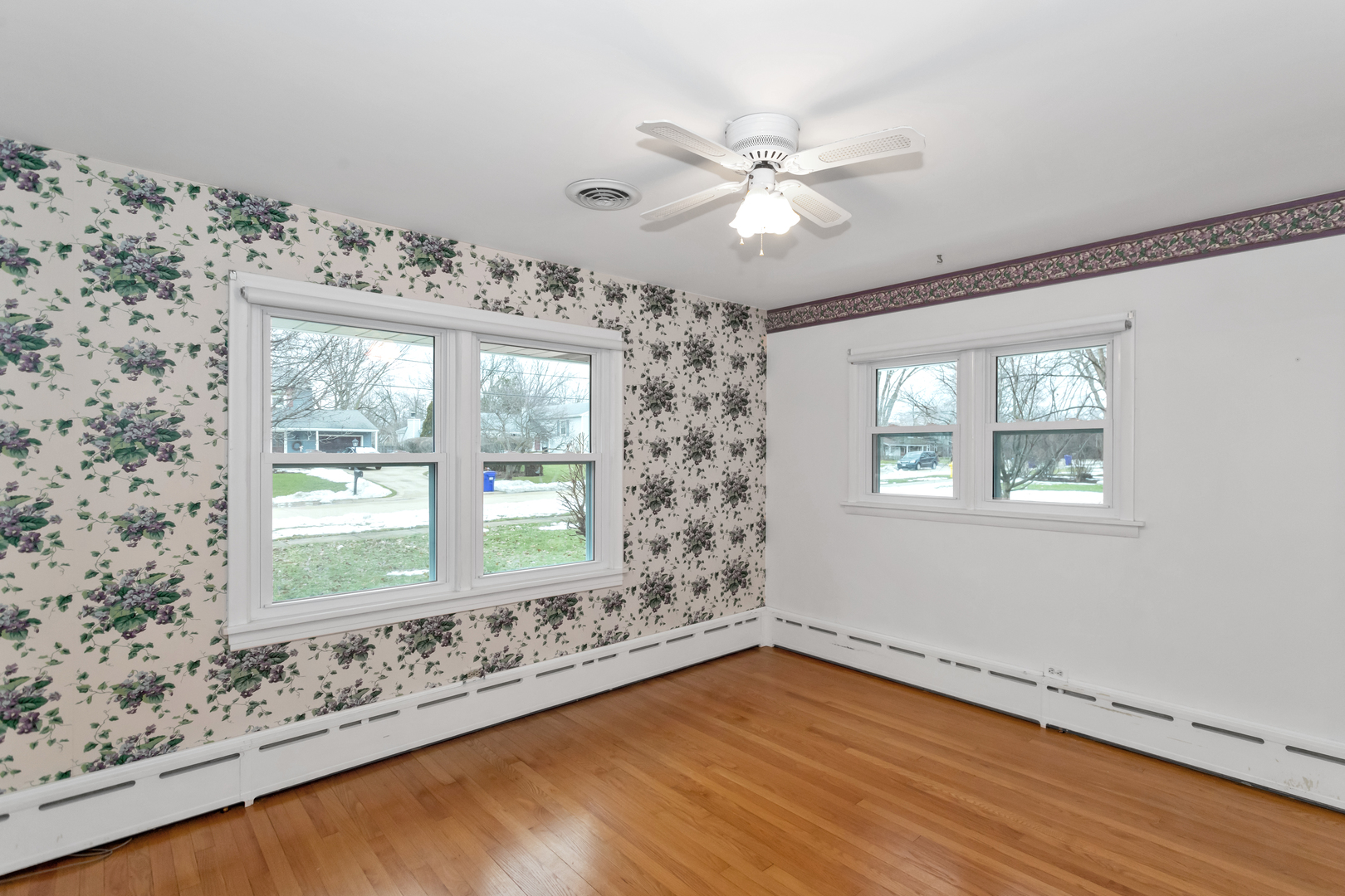 1700 Kay Road Wheaton, IL 60187 - Photo 22 of 38 a view of a livingroom with wooden floor and a window