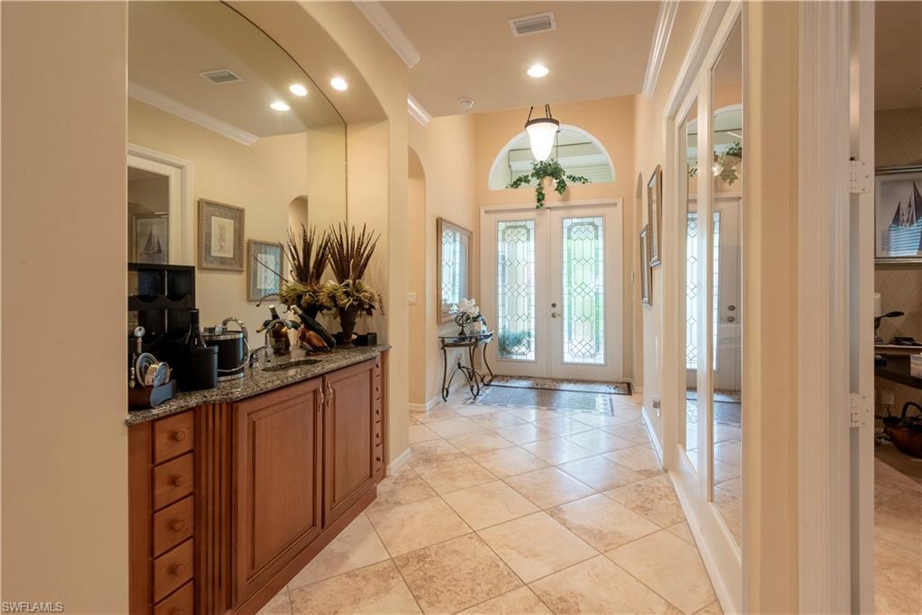 5725 Lago Villaggio Way Naples, FL 34104 - Photo 19 of 47 Entry / Wet Bar