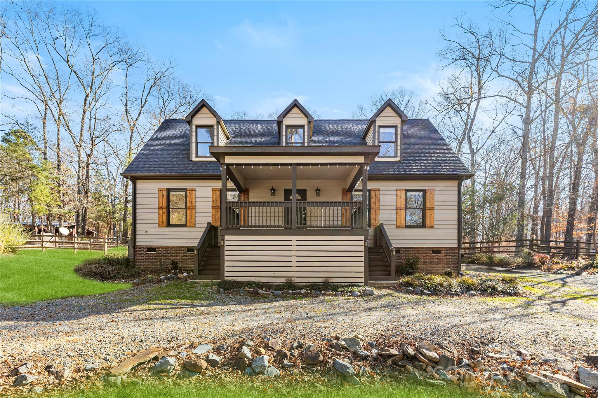 16218 Barbee Road Stanfield, NC 28163 - Photo 1 of 30 a front view of a house with a yard
