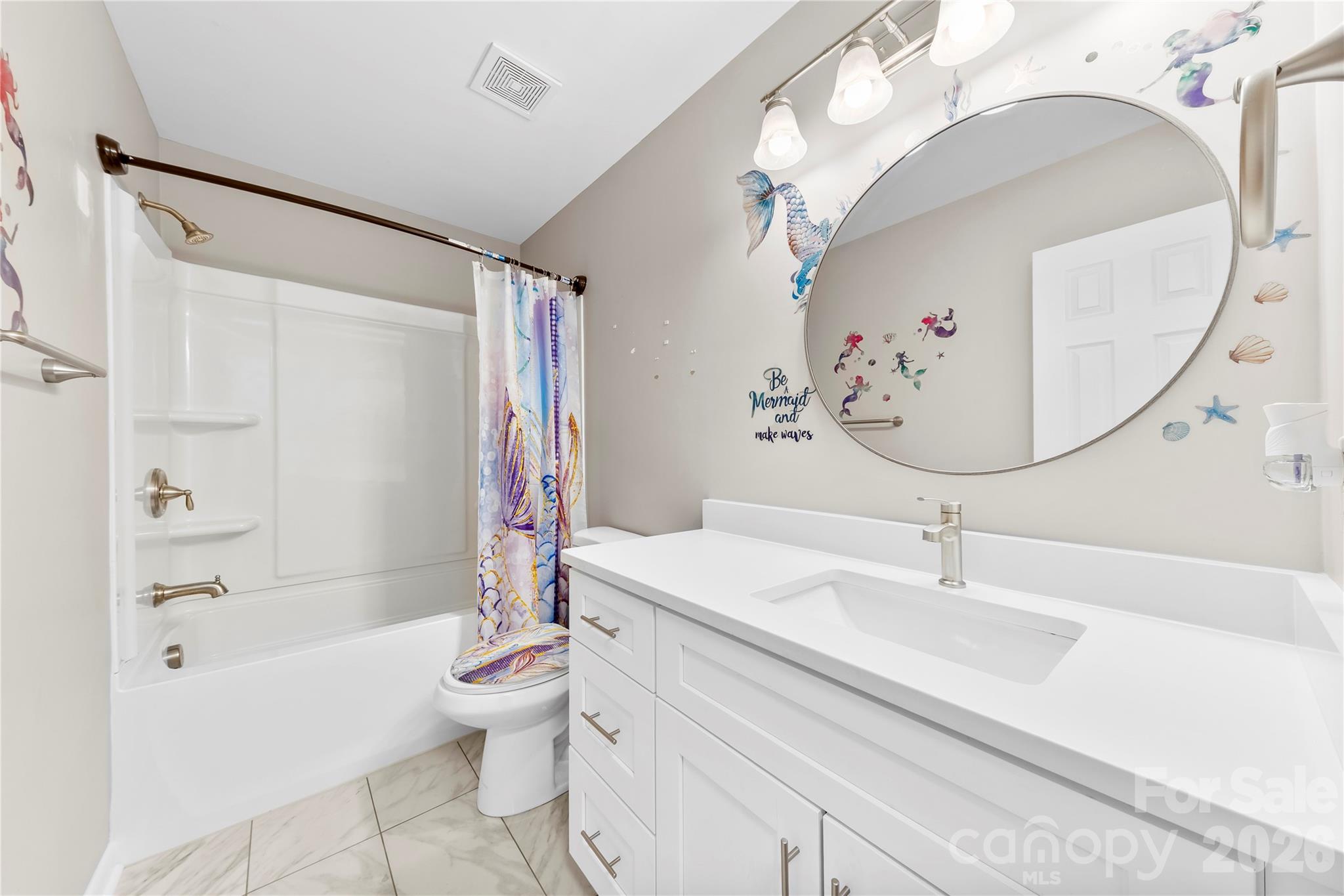 16218 Barbee Road Stanfield, NC 28163 - Photo 11 of 30 a bathroom with a sink a toilet and a mirror