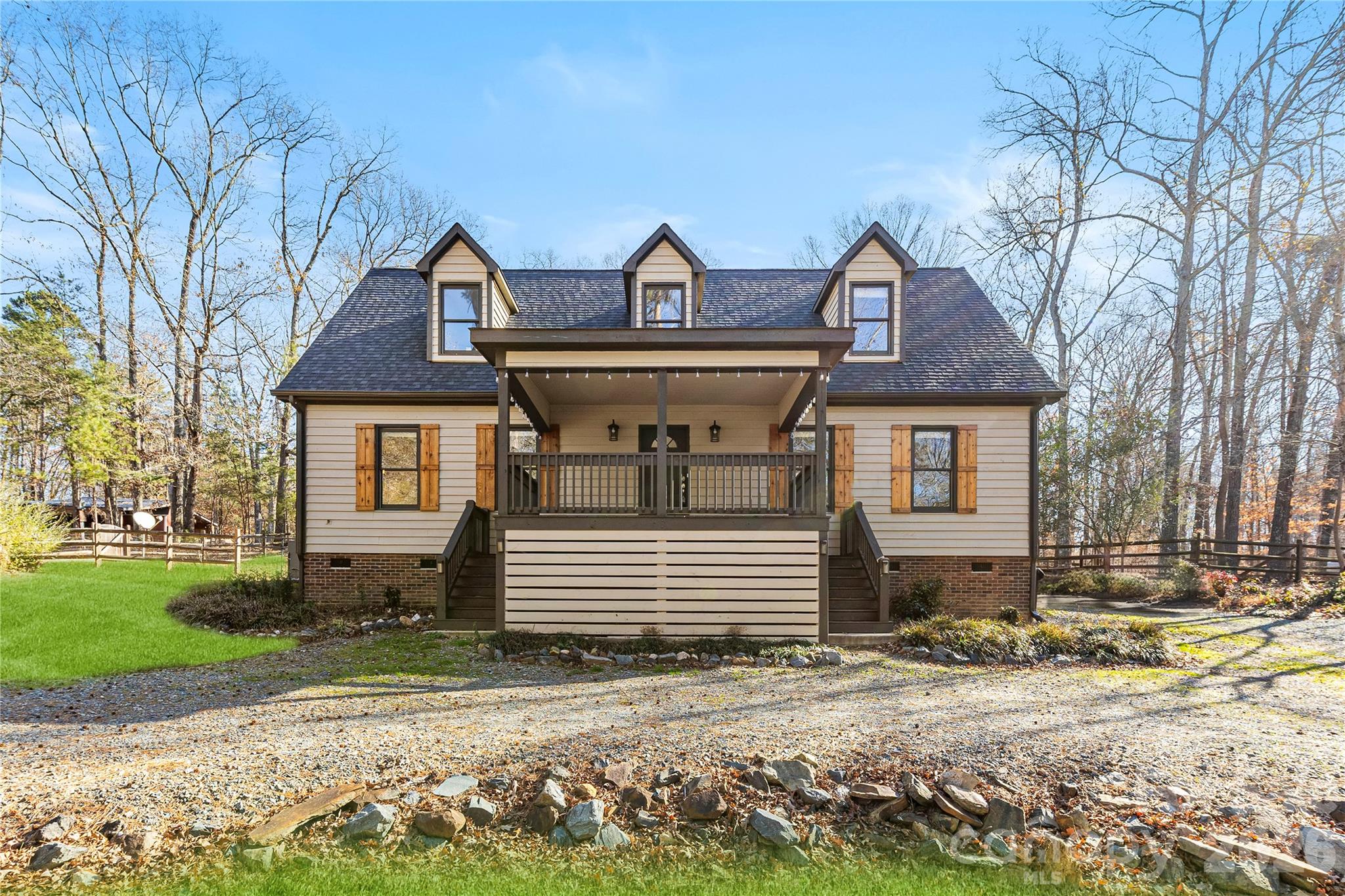 16218 Barbee Road Stanfield, NC 28163 - Photo 2 of 30 a front view of a house with a yard