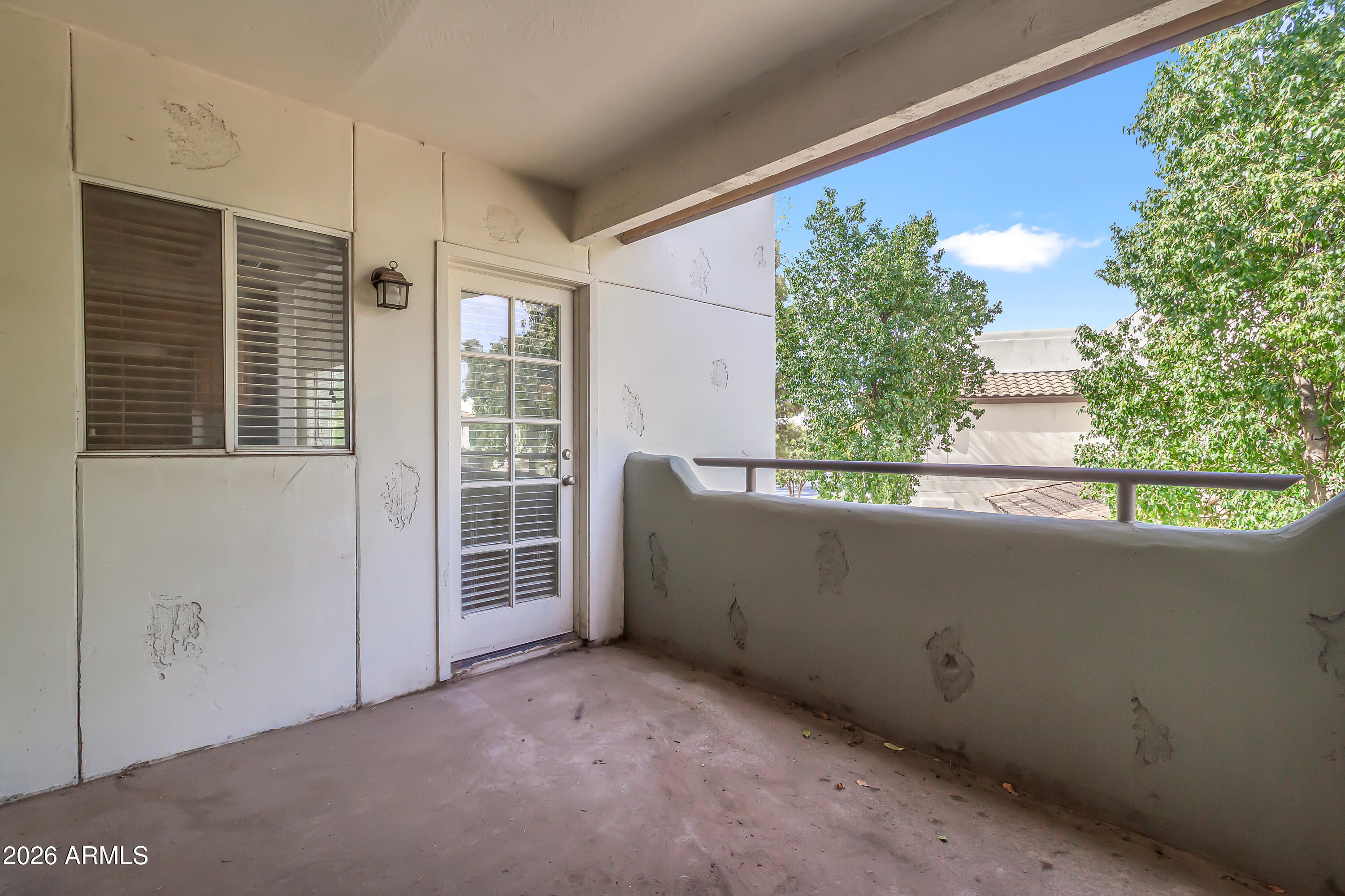1825 West Ray Road, Unit 2072 Chandler, AZ 85224 - Photo 36 of 47 Dining Room Exit to Balcony