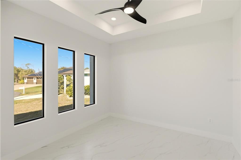 17 Long Meadow Road Rotonda West, FL 33947 - Photo 19 of 37 a view of an empty room and window