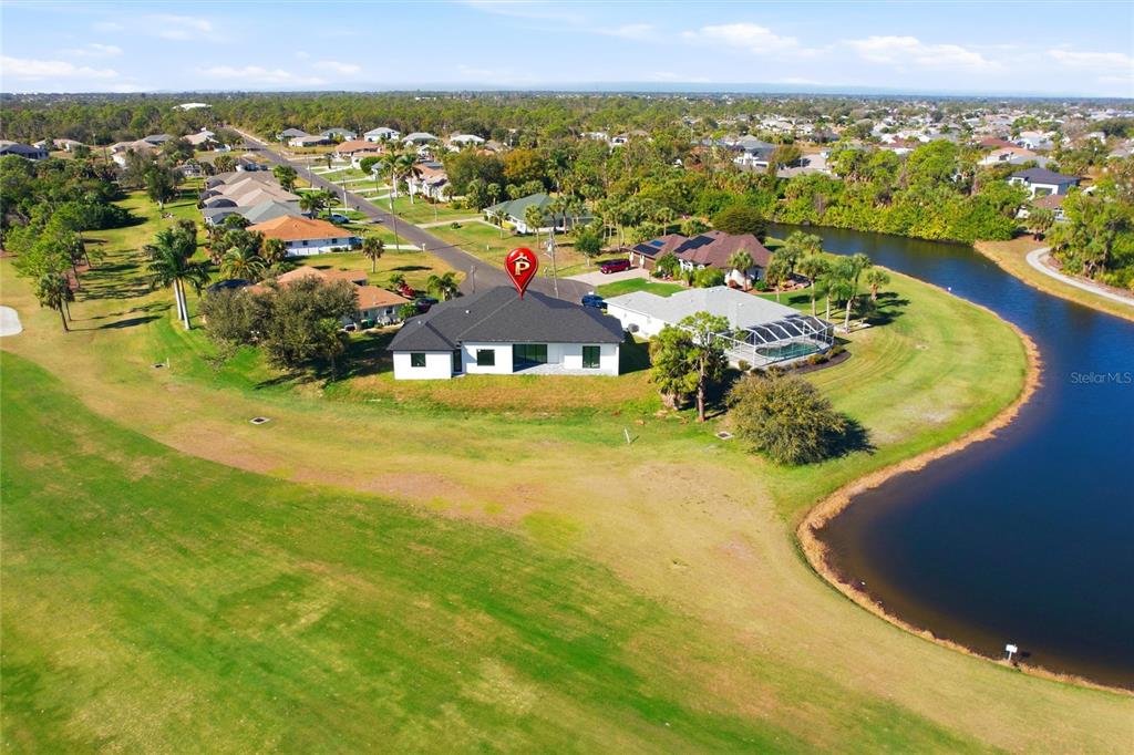 17 Long Meadow Road Rotonda West, FL 33947 - Photo 33 of 37 an aerial view of residential houses with outdoor space