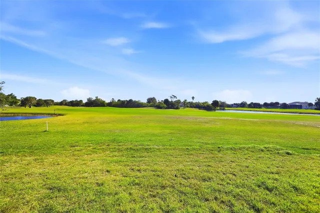 a view of a large building with beach