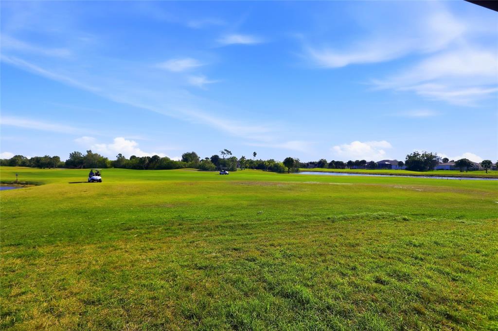 17 Long Meadow Road Rotonda West, FL 33947 - Photo 35 of 37 a view of a large building with beach