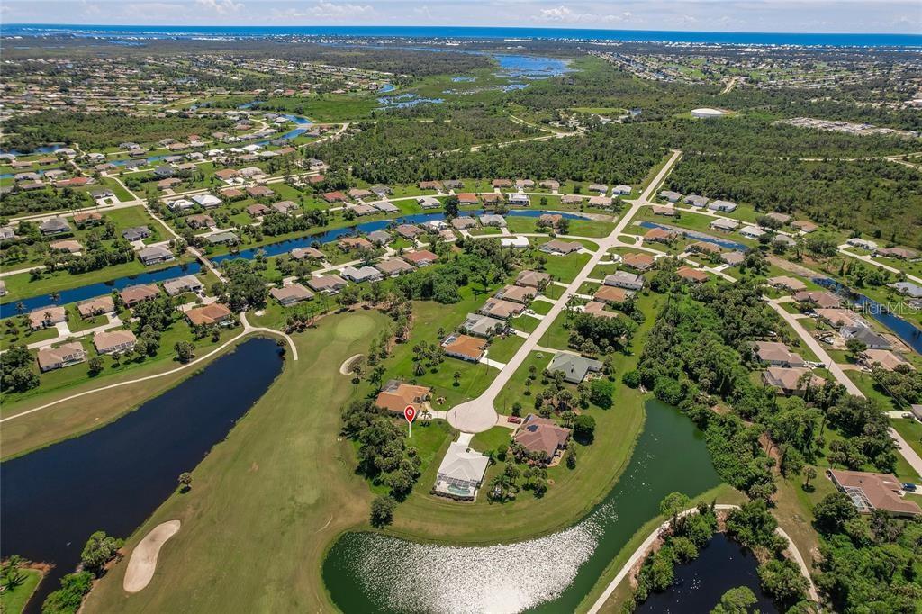 17 Long Meadow Road Rotonda West, FL 33947 - Photo 36 of 37 an aerial view of residential houses with outdoor space