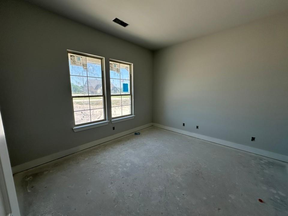 295 Brown Road Leonard, TX 75452 - Photo 17 of 26 Room featuring dual windows with multi-pane grilles, neutral wall paint, and white baseboards