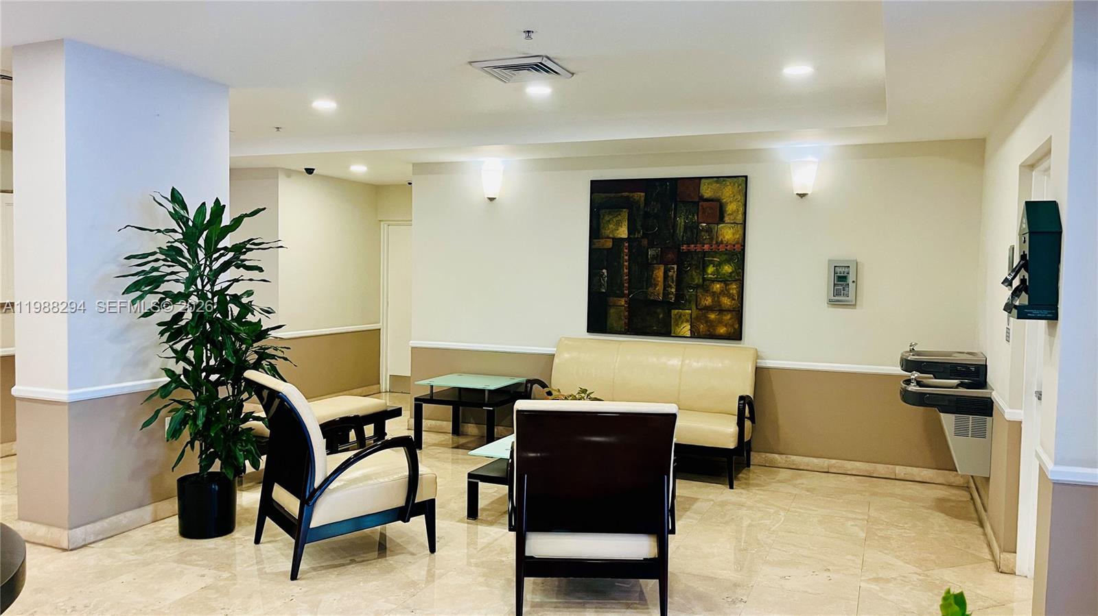 900 Southwest 8th Street, Unit 1509 Miami, FL 33130 - Photo 37 of 37 a living room with furniture and potted plants