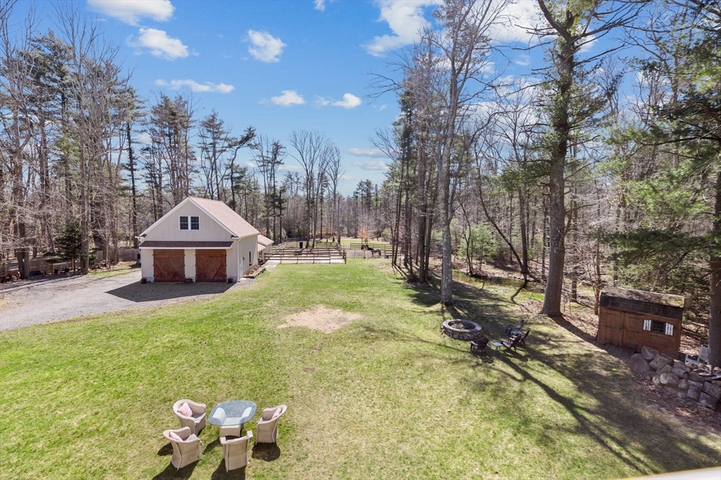 742 Broadway Hanover, MA 02339 - Photo 18 of 42 a view of a house with a yard