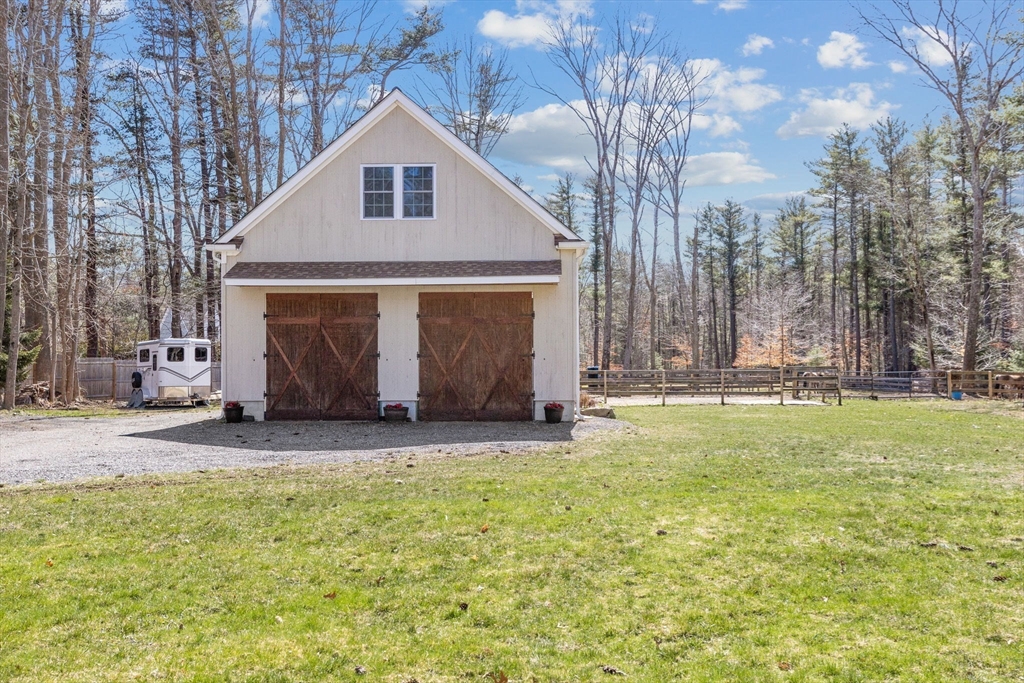 742 Broadway Hanover, MA 02339 - Photo 20 of 42 a front view of a house with a yard
