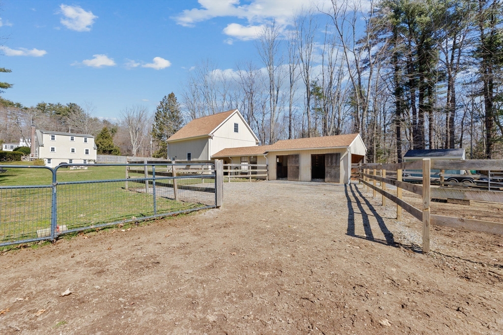 742 Broadway Hanover, MA 02339 - Photo 22 of 42 a view of a house with a yard