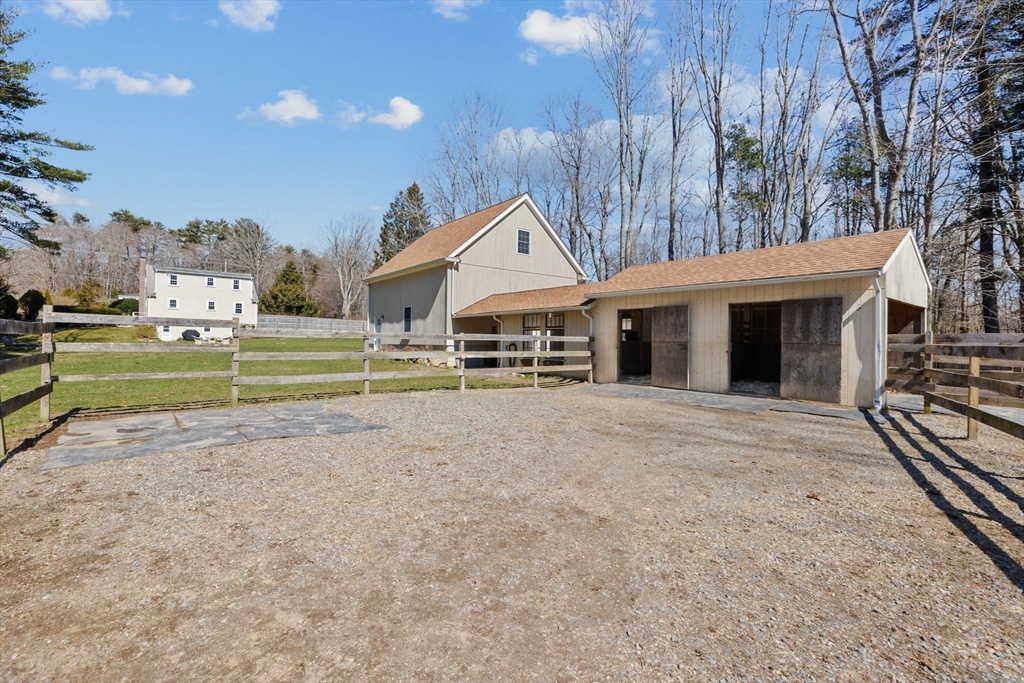 742 Broadway Hanover, MA 02339 - Photo 24 of 42 a front view of a house with a yard