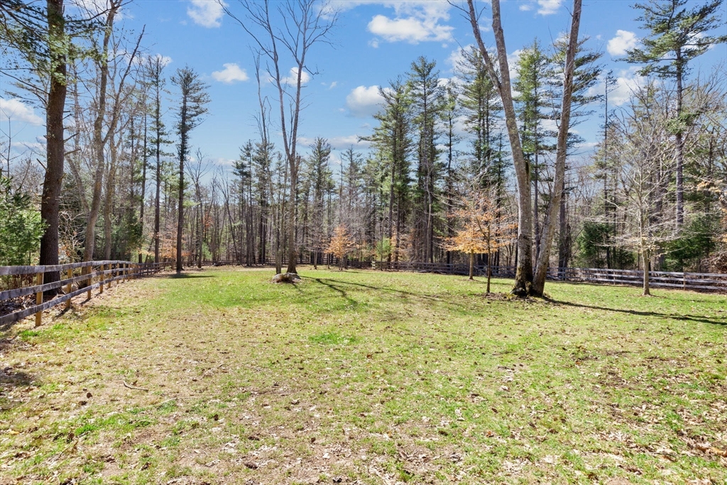 742 Broadway Hanover, MA 02339 - Photo 29 of 42 a swimming pool with outdoor seating and yard
