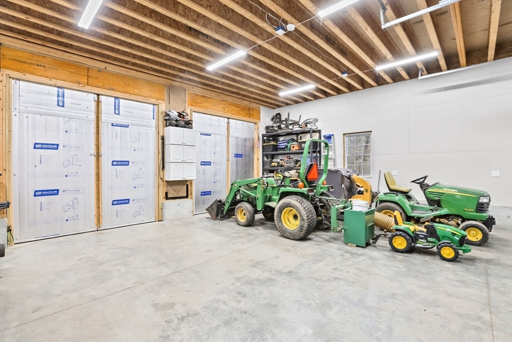 742 Broadway Hanover, MA 02339 - Photo 33 of 42 a view of a garage with parked cars