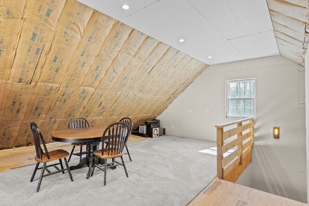 742 Broadway Hanover, MA 02339 - Photo 35 of 42 a dining room with furniture and wooden floor