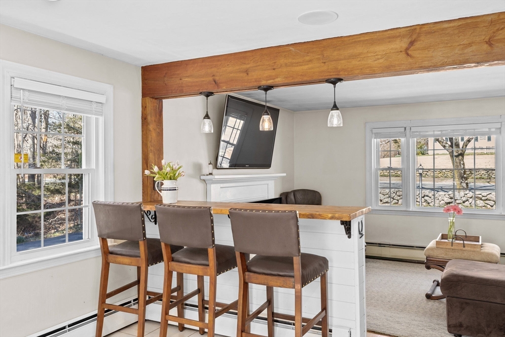 742 Broadway Hanover, MA 02339 - Photo 4 of 42 a dining room with furniture and window