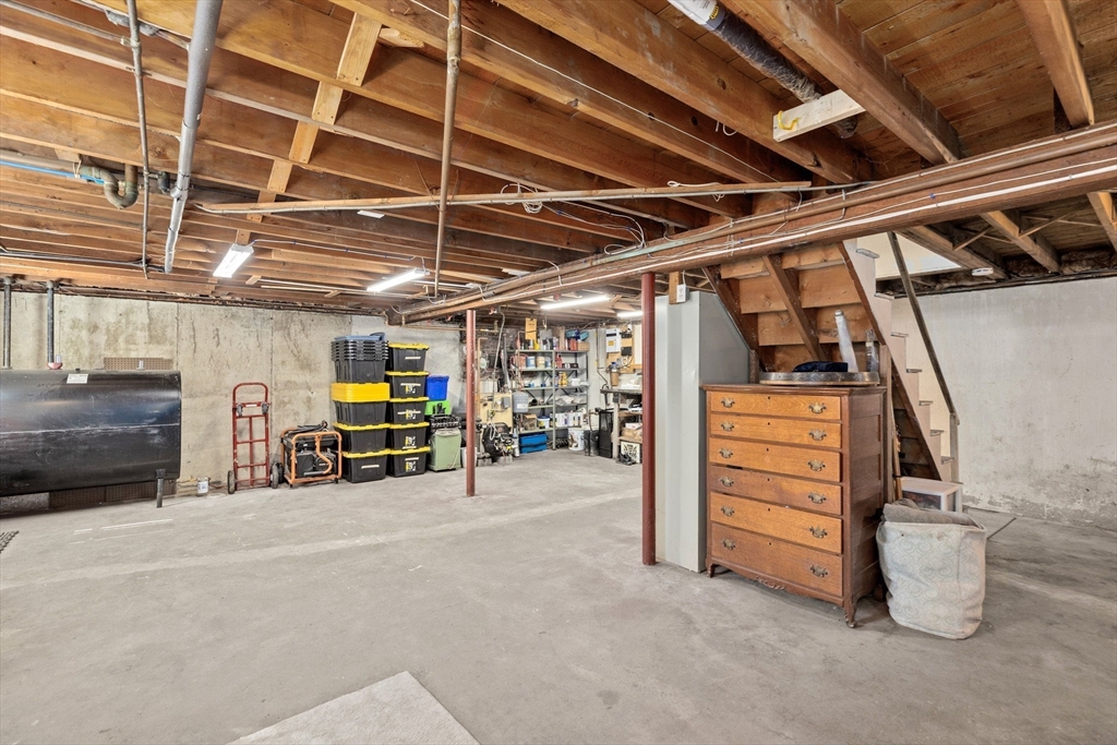 742 Broadway Hanover, MA 02339 - Photo 42 of 42 a view of a garage with storage