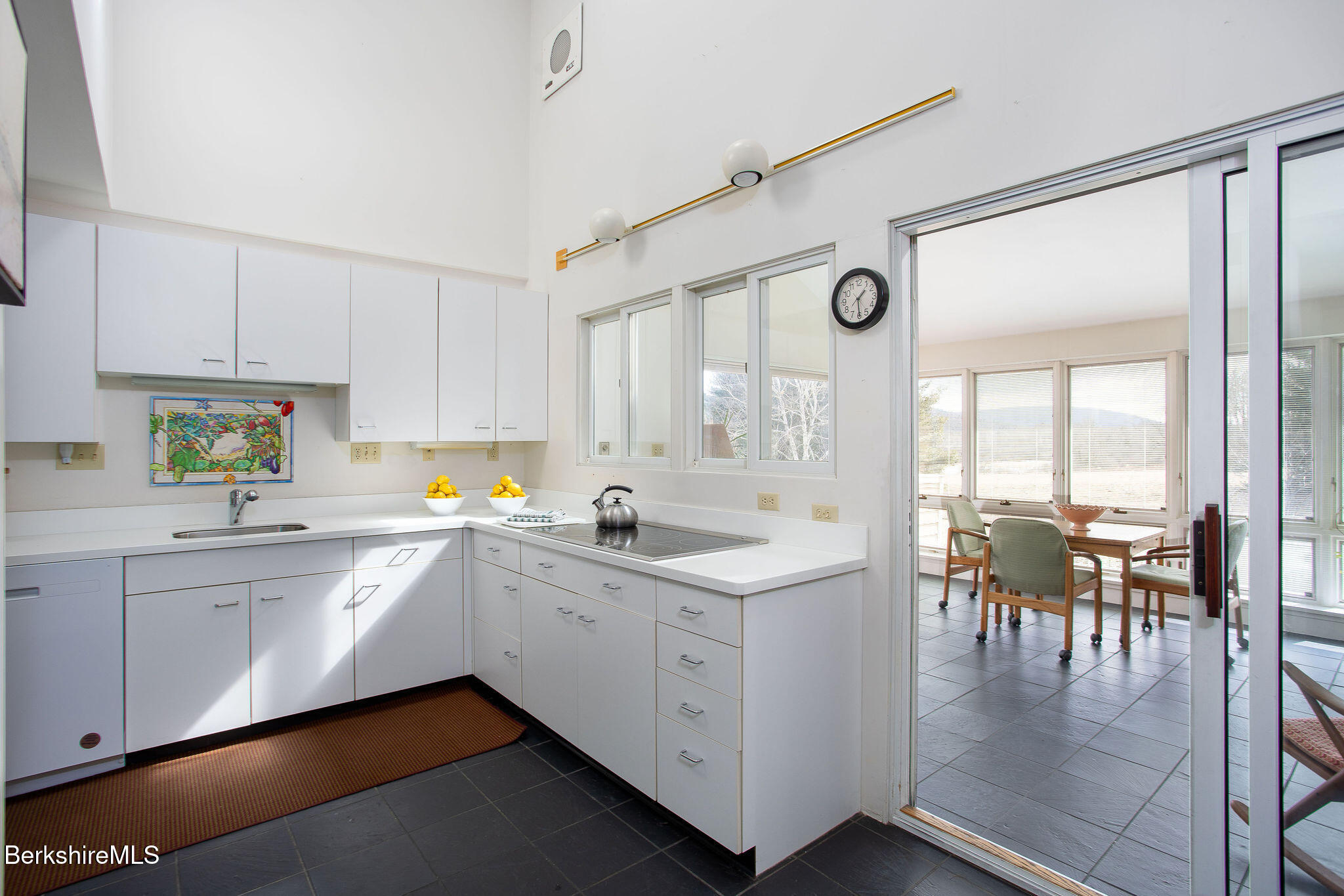 103 Gravesleigh Terrace Pittsfield, MA 01201 - Photo 17 of 46 a kitchen with a sink and cabinets