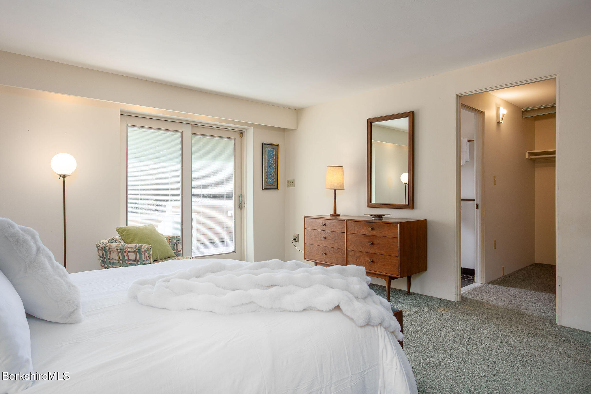 103 Gravesleigh Terrace Pittsfield, MA 01201 - Photo 24 of 46 a bedroom with a bed and large mirror