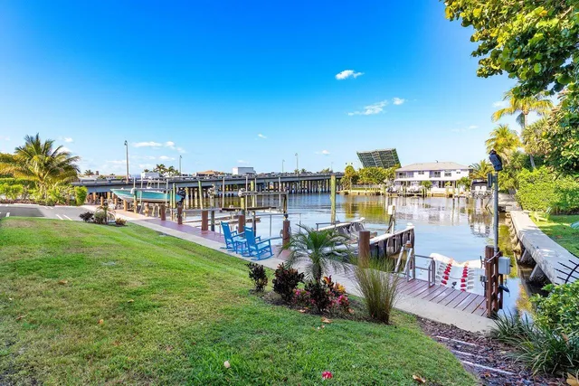 a view of a garden with houses