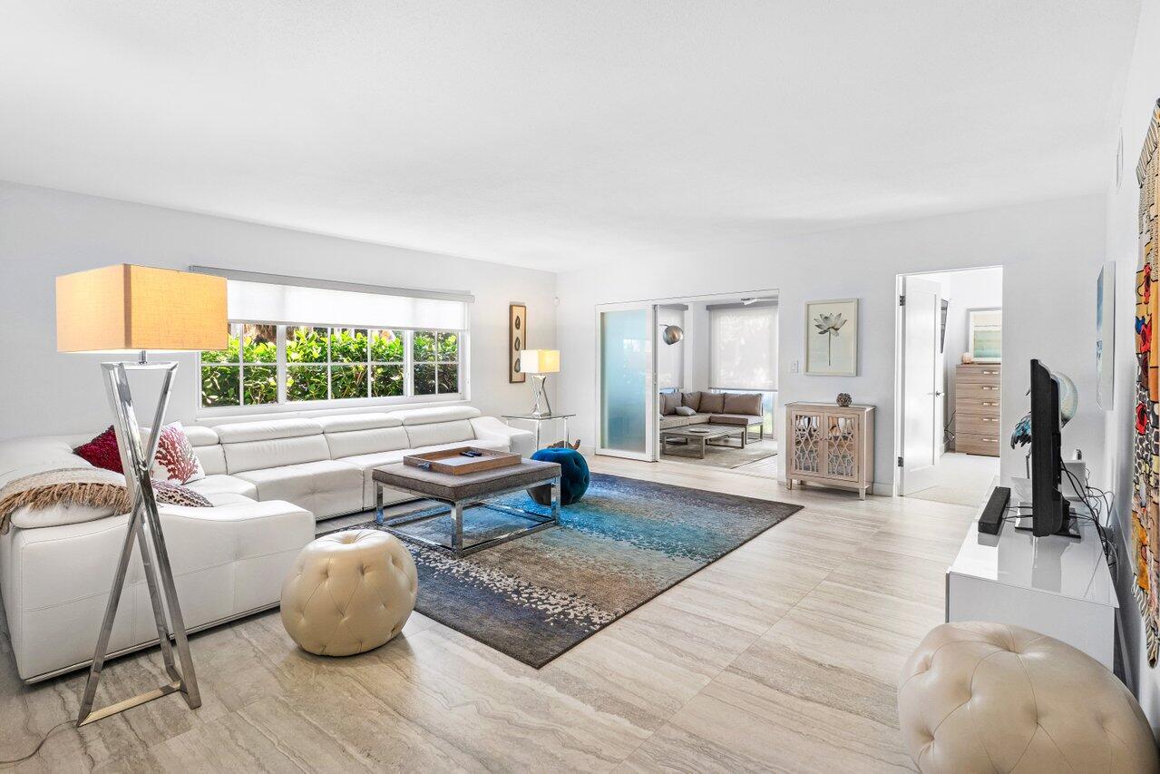 1700 South Ocean Boulevard, Unit 1 Delray Beach, FL 33483 - Photo 10 of 39 a living room with furniture and a window
