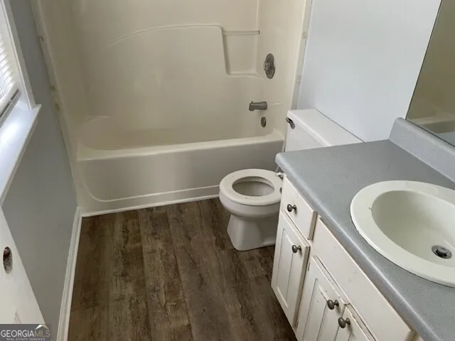 a bathroom with a sink and a toilet
