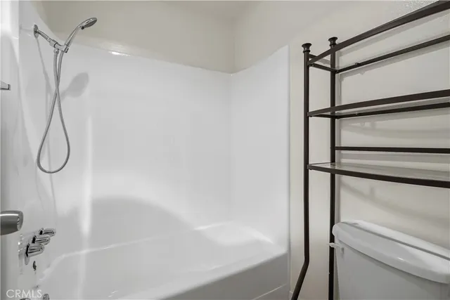 a wooden door in a backyard