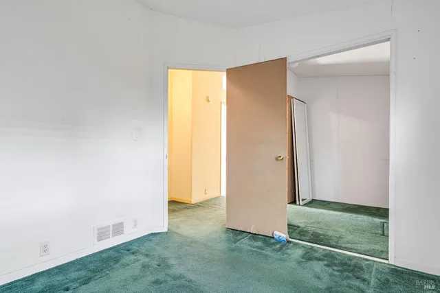 an empty room with an door