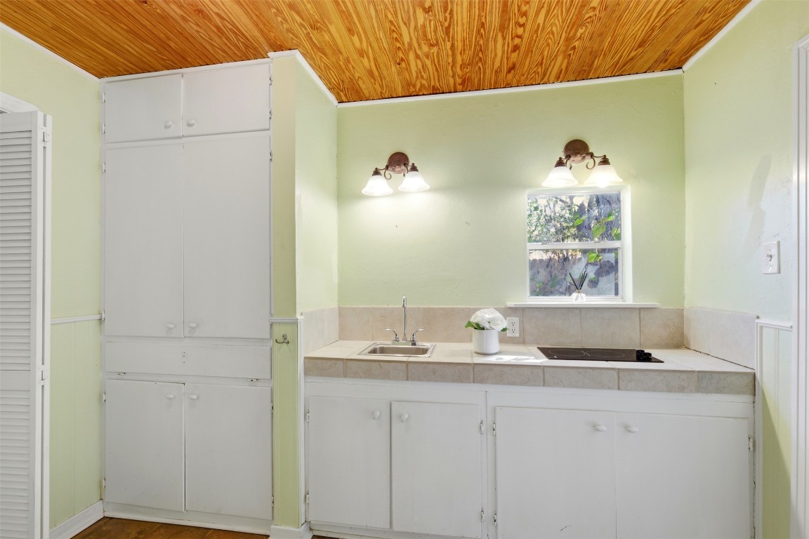 1506 Grace Street Taylor, TX 76574 - Photo 19 of 21 Secondary ensuite / full bath, a stall shower, a tub, and tile walls