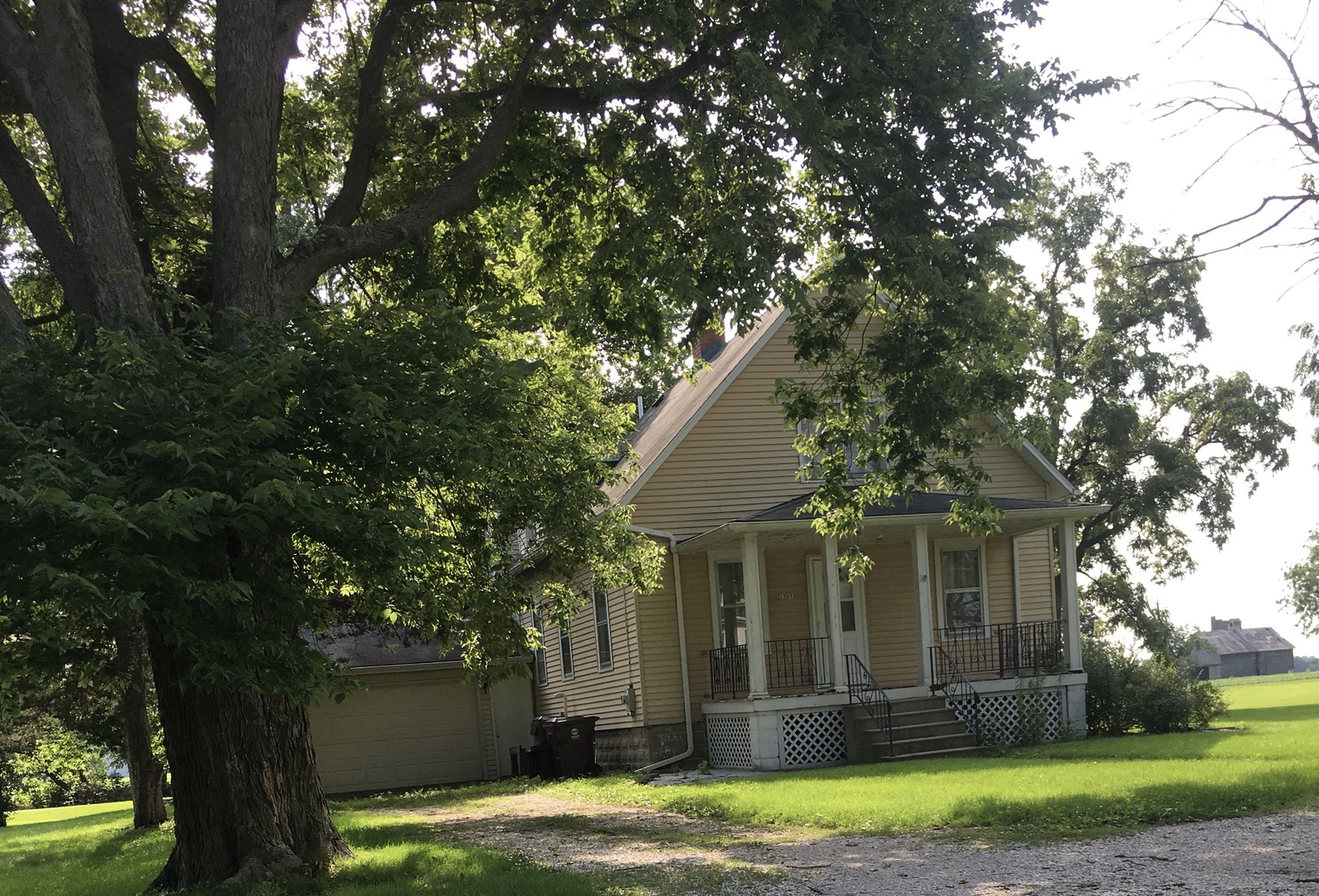 13078 Church Road Yorkville, IL 60560 - Photo 1 of 22 a front view of a house with garden