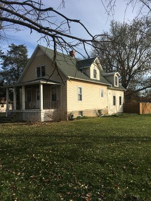 13078 Church Road Yorkville, IL 60560 - Photo 2 of 22 a front view of a house with a garden