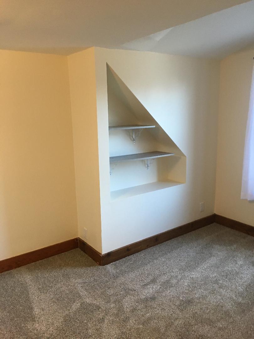 13078 Church Road Yorkville, IL 60560 - Photo 14 of 22 an empty room with a bench