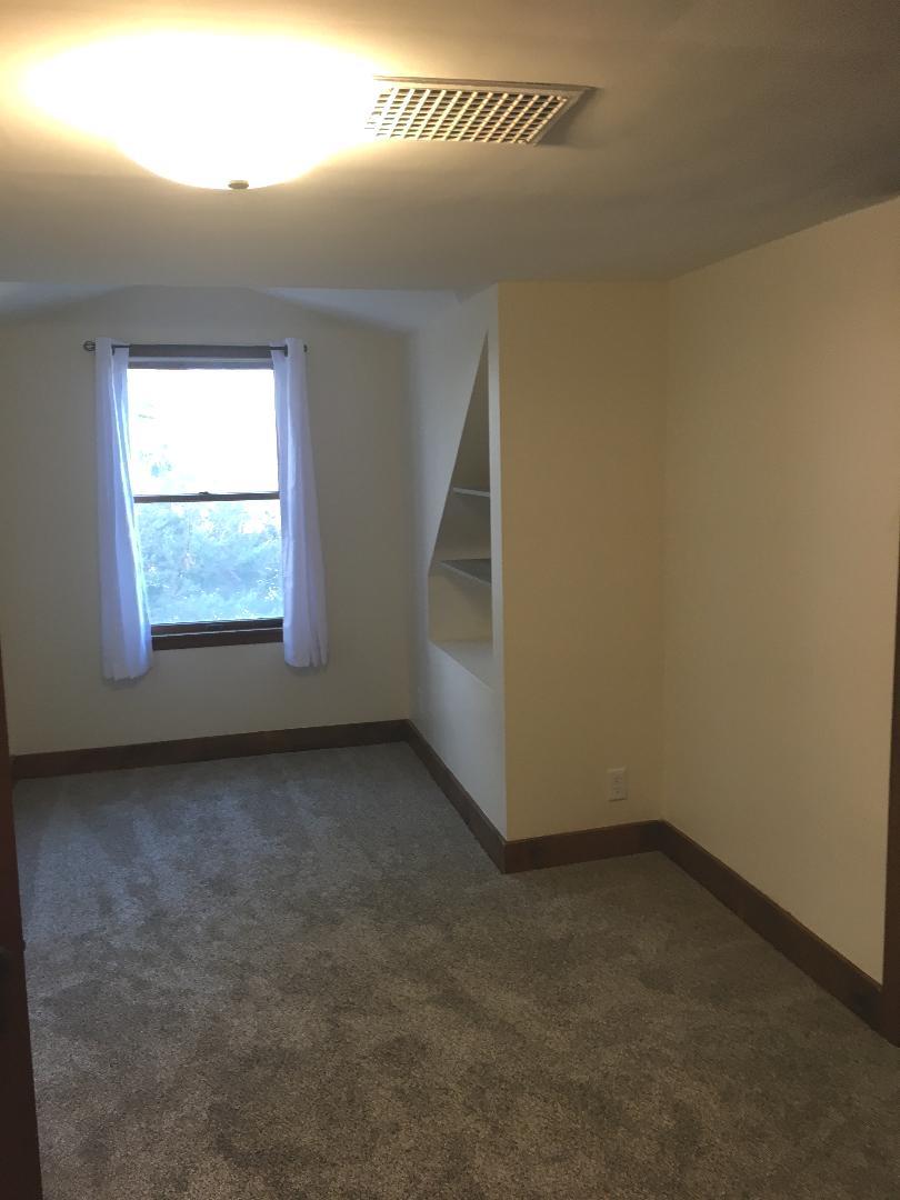 13078 Church Road Yorkville, IL 60560 - Photo 15 of 22 an empty room with a window