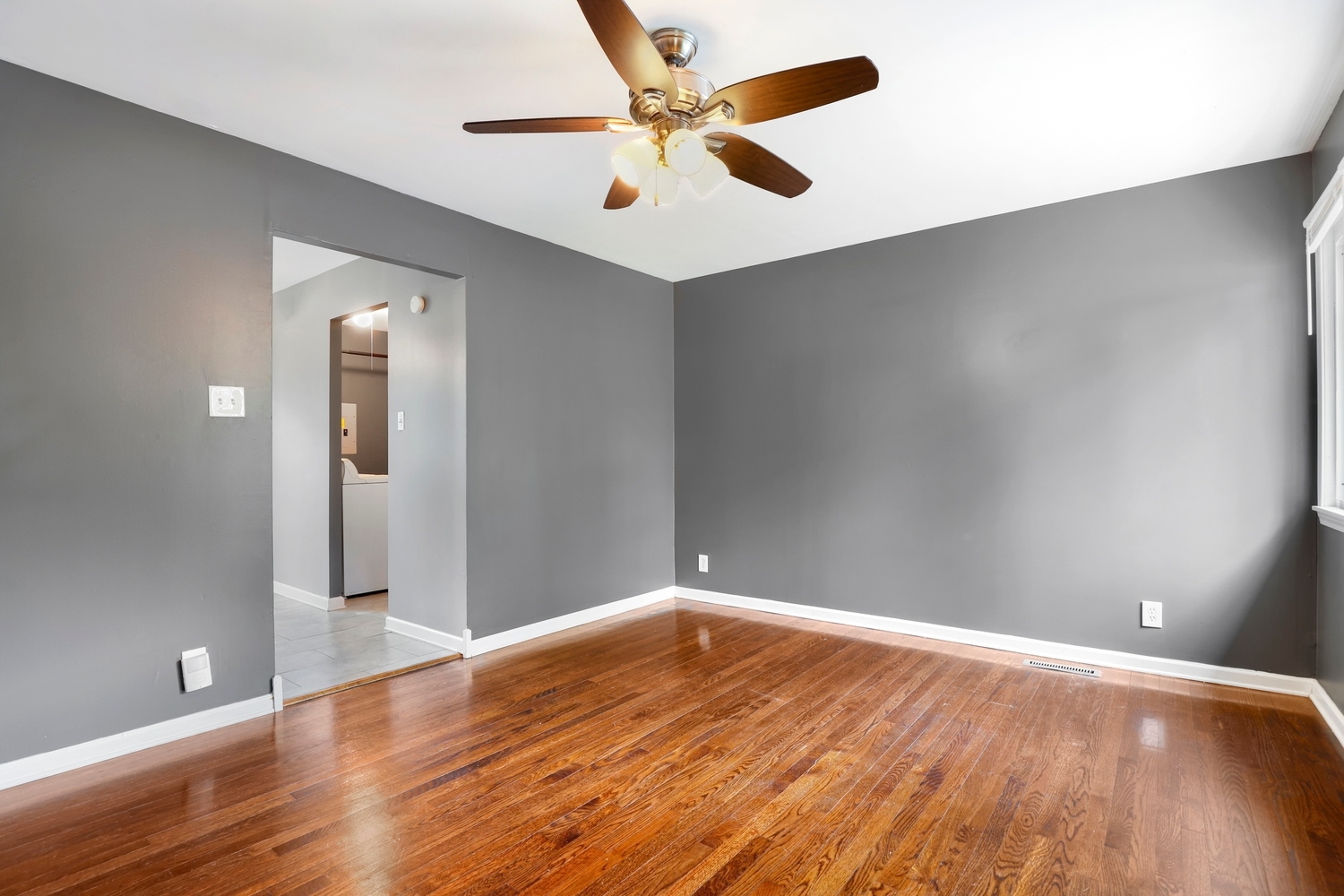 231 West 35th Street Steger, IL 60475 - Photo 4 of 17 wooden floor in an empty room