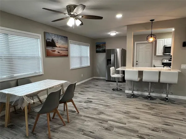 a view of a dining room with furniture