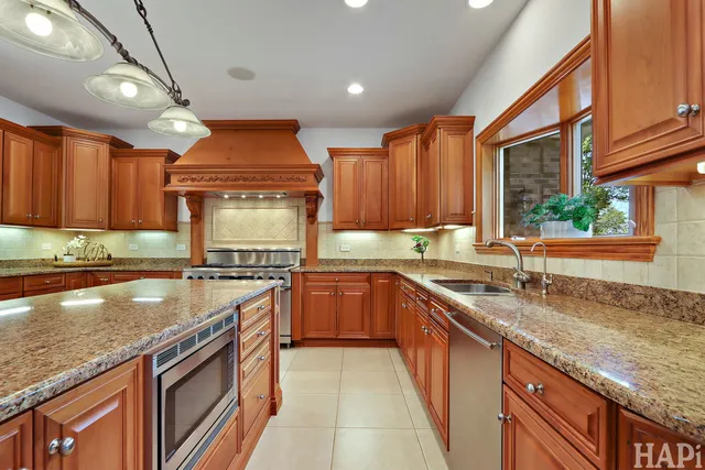 a view of a bedroom with furniture window and wooden floor