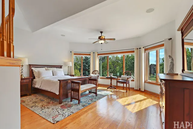 a living room with fireplace furniture and a fireplace