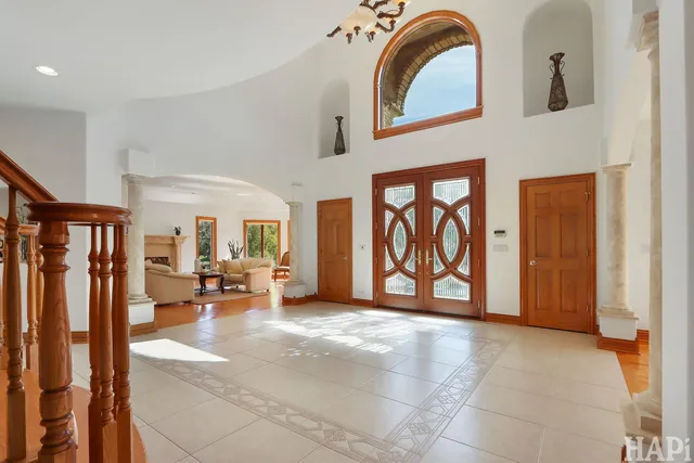 a view of a livingroom with furniture and a window