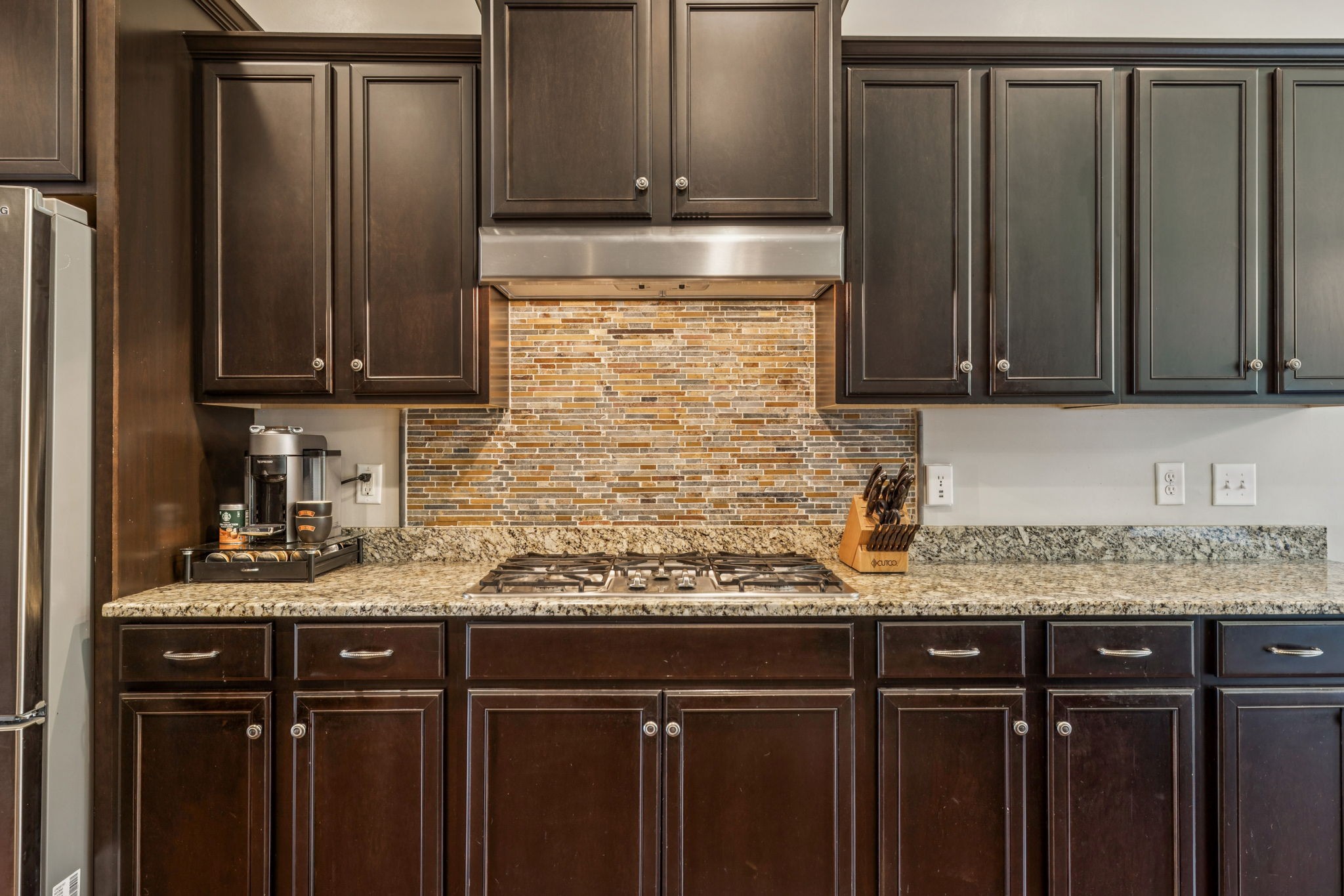 1501 Registry Row Arrington, TN 37014 - Photo 13 of 77 a kitchen with granite countertop a refrigerator and a sink